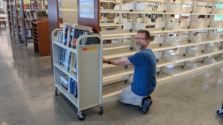 Library Manager Michael Brown re-positioned every shelf and bookend within the main stacks. A staging area was set up close to the temporary workroom where books were grouped and further evaluated prior to cataloging and processing.