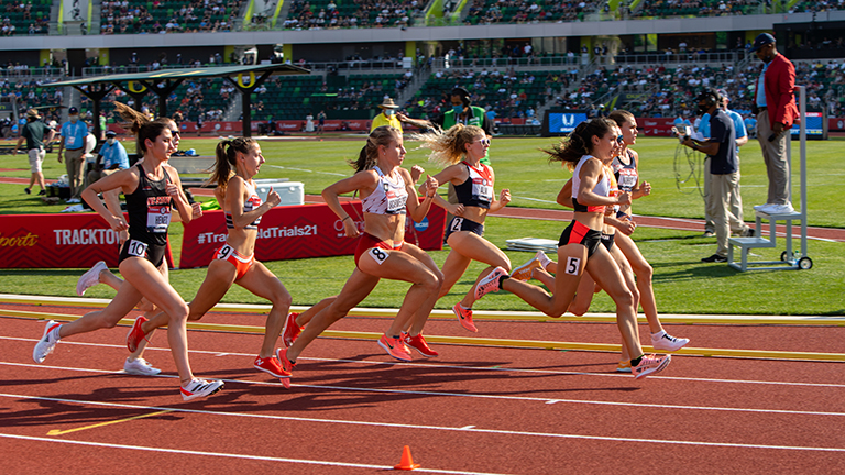 Women athletes running on a track