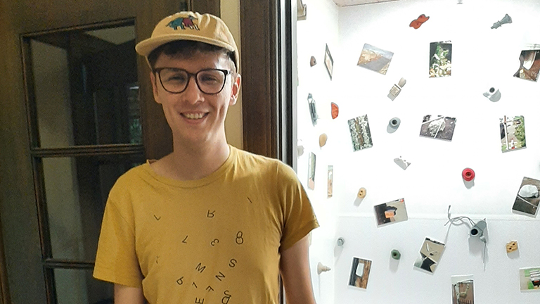 Connor Gordon sets up his Tiny Gallery