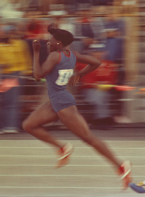 woman running on a track