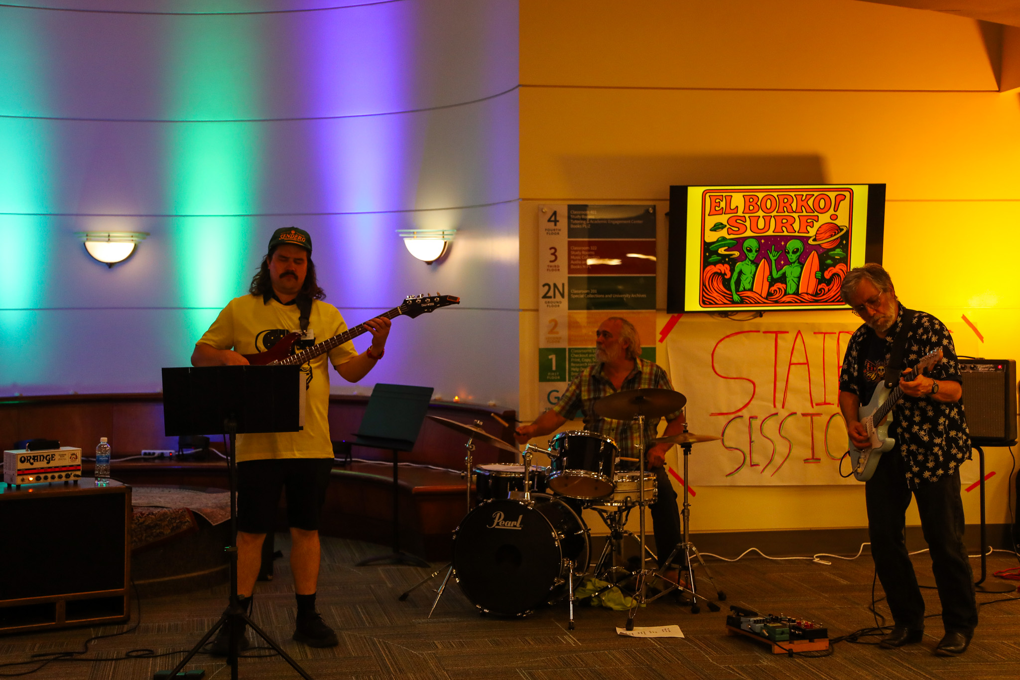 Musical trio El Borko Surf performing in Knight Library.