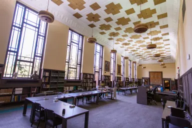 Reading room with windows along one wall in Special Collections and University Archives