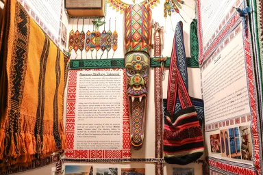 colorful textiles in tiny gallery exhibit