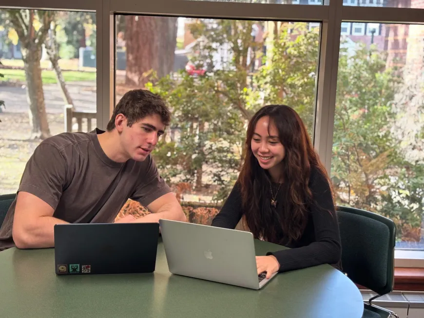 Image of peer tutoring help against a window