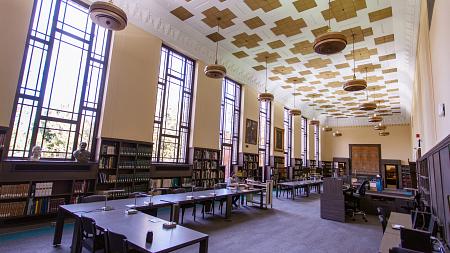 Reading room with windows along one wall in Special Collections and University Archives