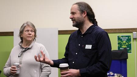 Jimmy Murray talking to Director of Operations Amy Lake. 