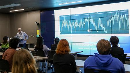 People sitting in the Viz Lab 