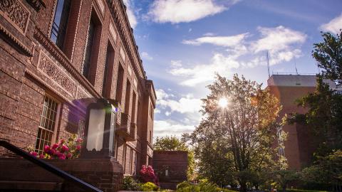 Exterior of Knight Library during a sunset