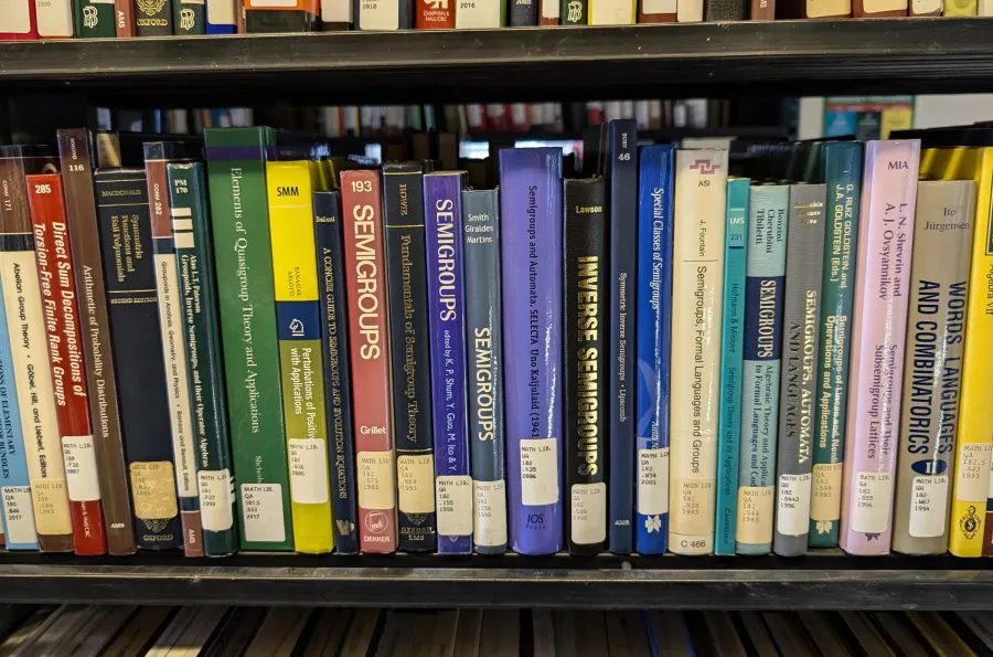 Math books on library shelf