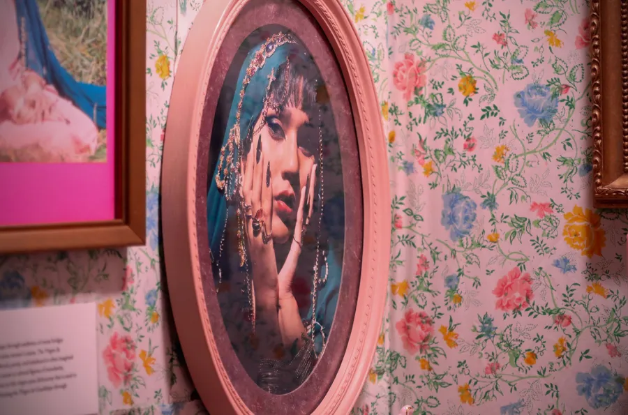 framed portrait in tiny gallery space